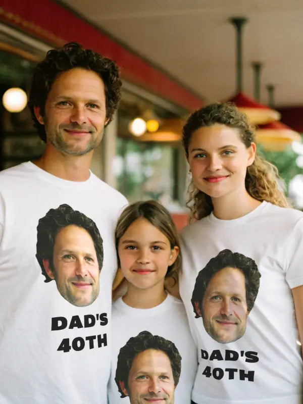 Family wearing matching birthday T-shirts with large face iron on transfers and text