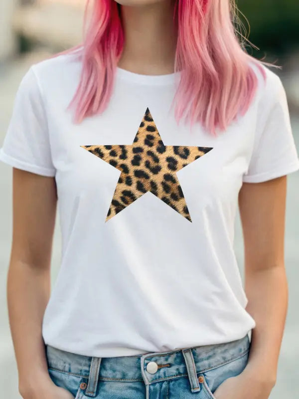 Lady with pink hair wearing white T-shirt with large leopard print star made using iron on transfers.