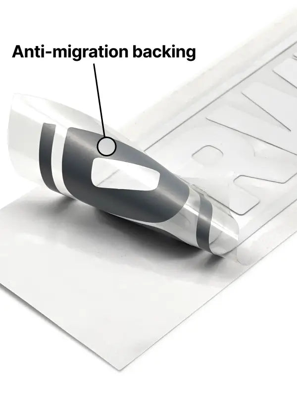 Close-up of anti-migration backing on custom iron on transfers for sportswear protection