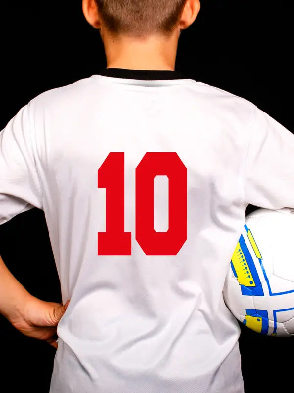Close-up of back of white football shirt with red number 10 applied using football name and number iron on transfers.