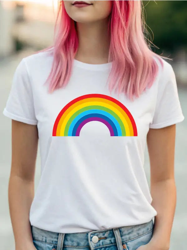 Close-up of woman in white shirt wearing a vibrant large iron on rainbow transfer featuring bold, colourful arcs.