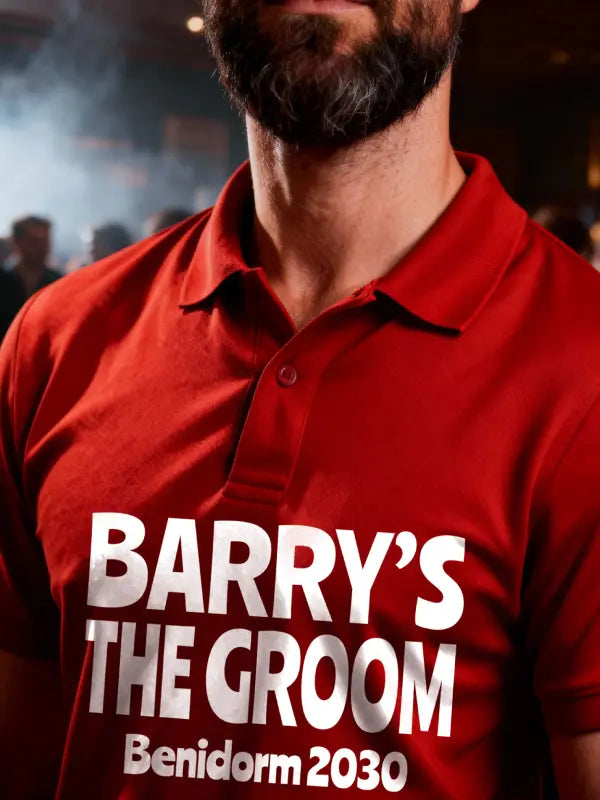 Man wearing a red polo shirt with 'Barry's The Groom Benidorm 2030' text.